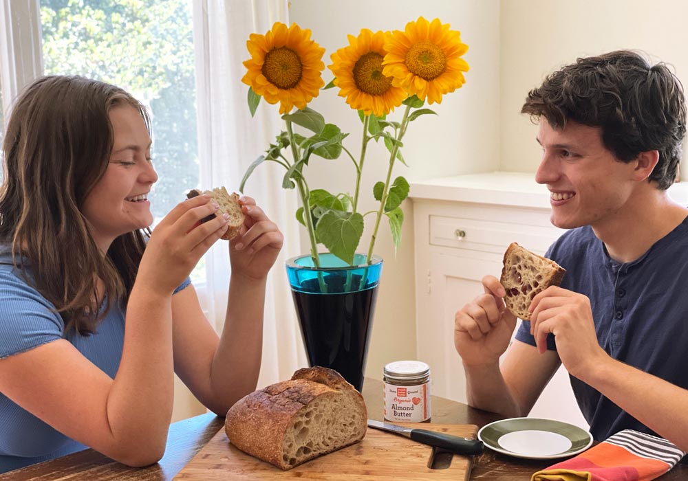 Couple enjoying sunbutter sandwiches