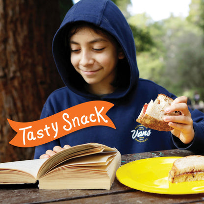 Boy enjoying sunflower butter sandwich